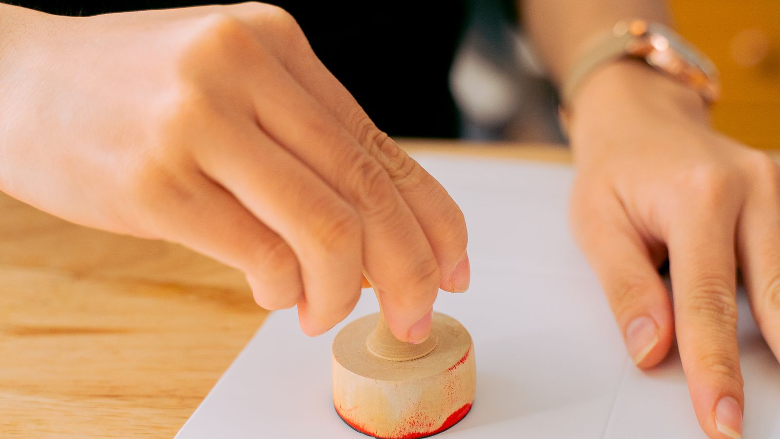 Hand stamping a legal document