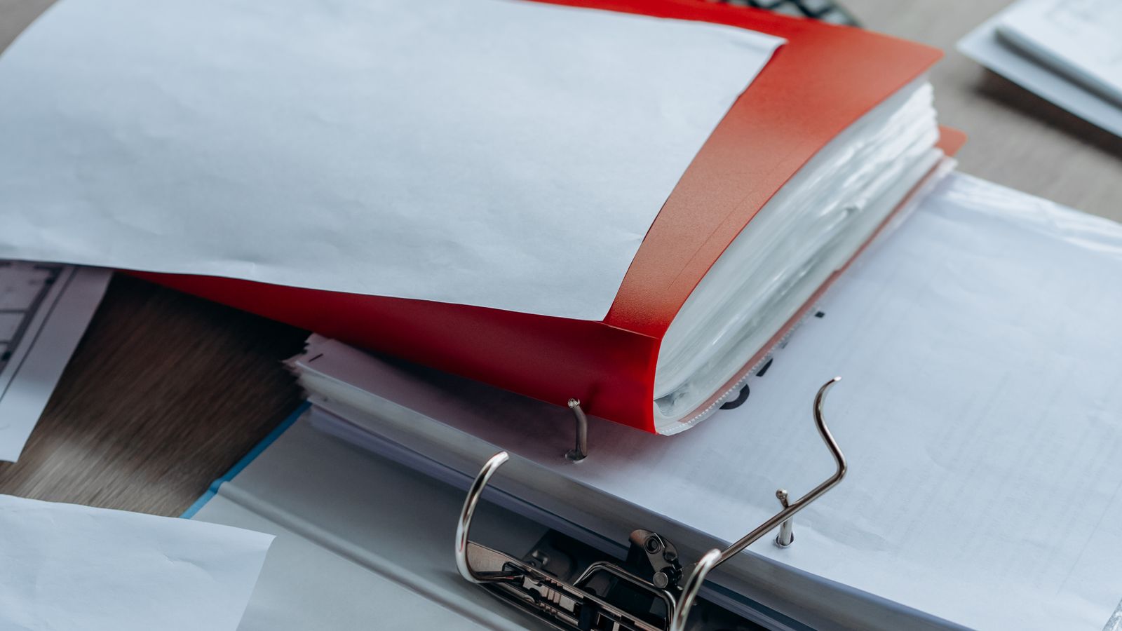 Stack of documents and files required for a rent agreement